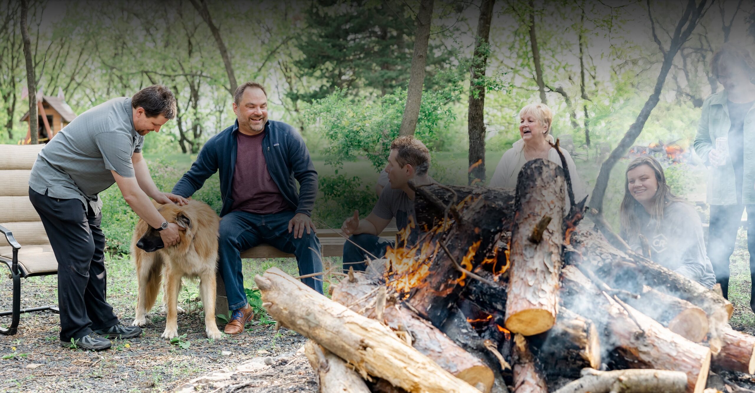 Fireside Financial Partners Main Image of staff around camp fire